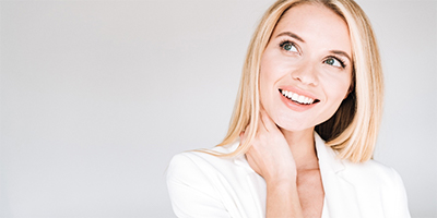 A young woman smiling