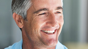 Aged man smiling with youthful smile 
